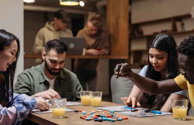 Students playing board games in Adelaide