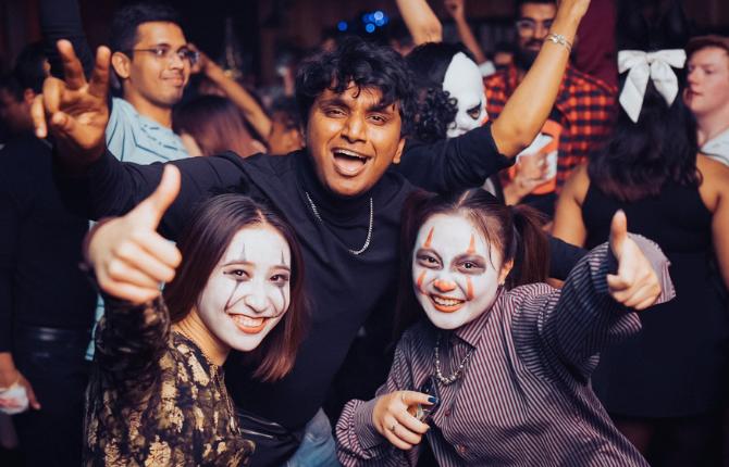 Students enjoying the StudyAdelaide Halloween dance party