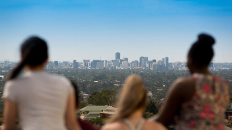 Students looking over Adelaide CBD from a high advantage point